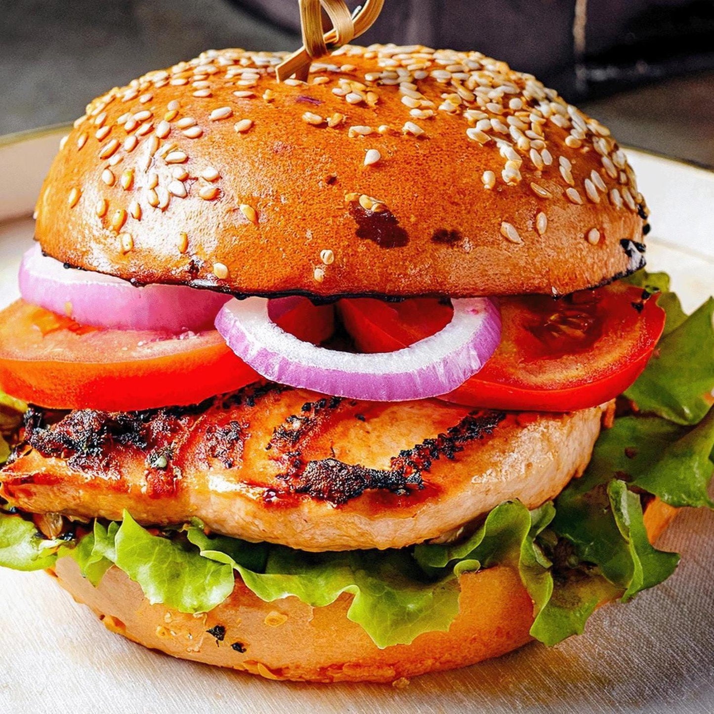 Grilled chicken Sandwich with lettuce, tomato and onion