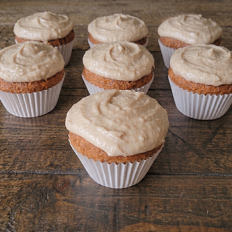 Close-up of a Root Beer Float cupcake with a vanilla bean frosting