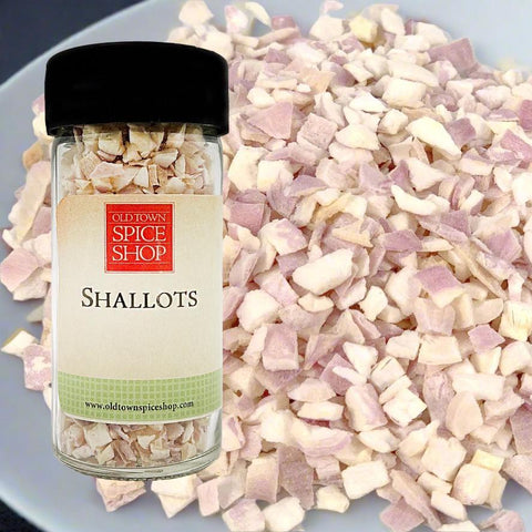 Jar of Old Town Spice Shop shallots with shallot pieces in the background