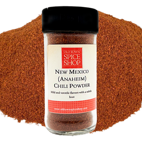 Jar of New Mexico Chili Powder from Old Town Spice Shop with chili powder on a white background