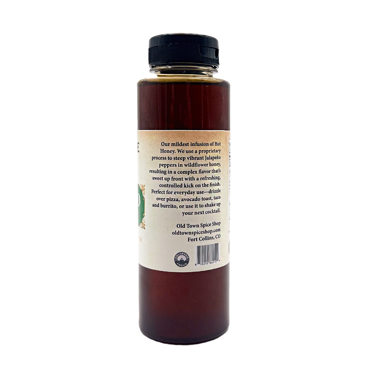 Bottle of honey with a label on a white background