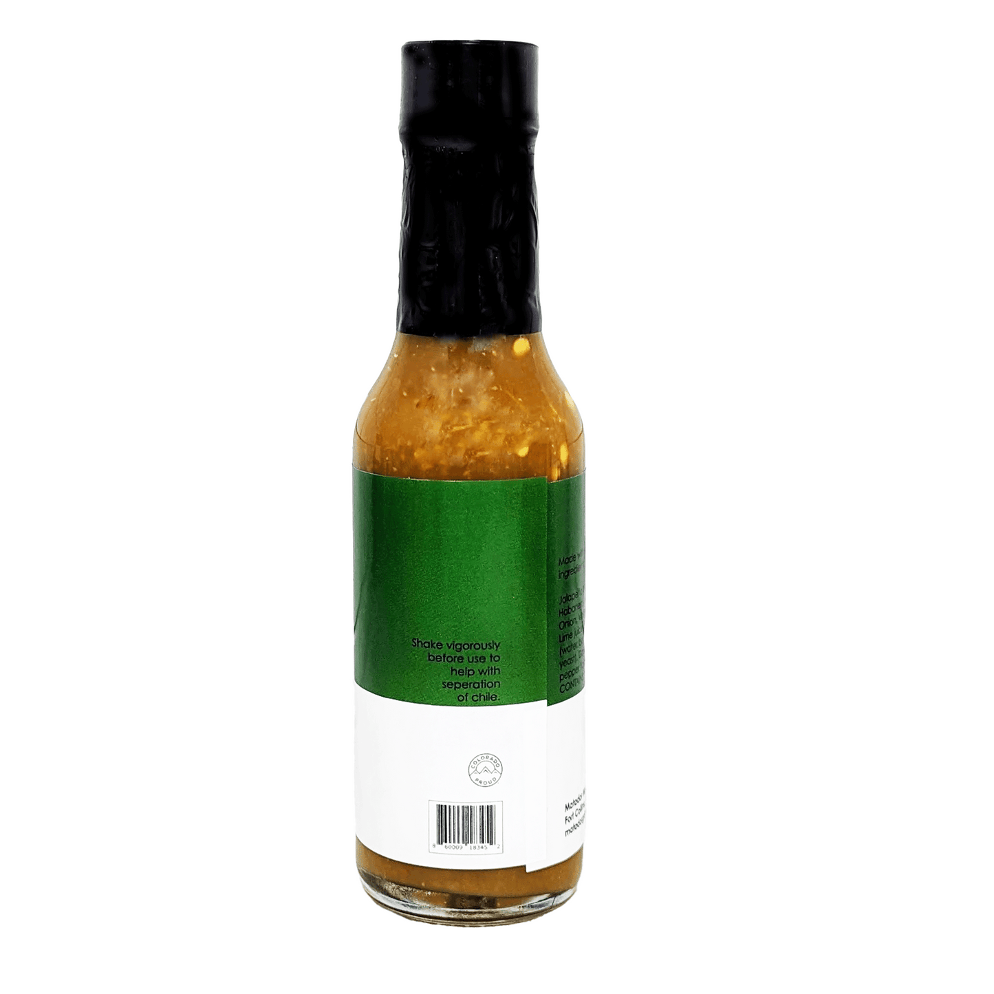 Bottle of hot sauce with a green label on a white background