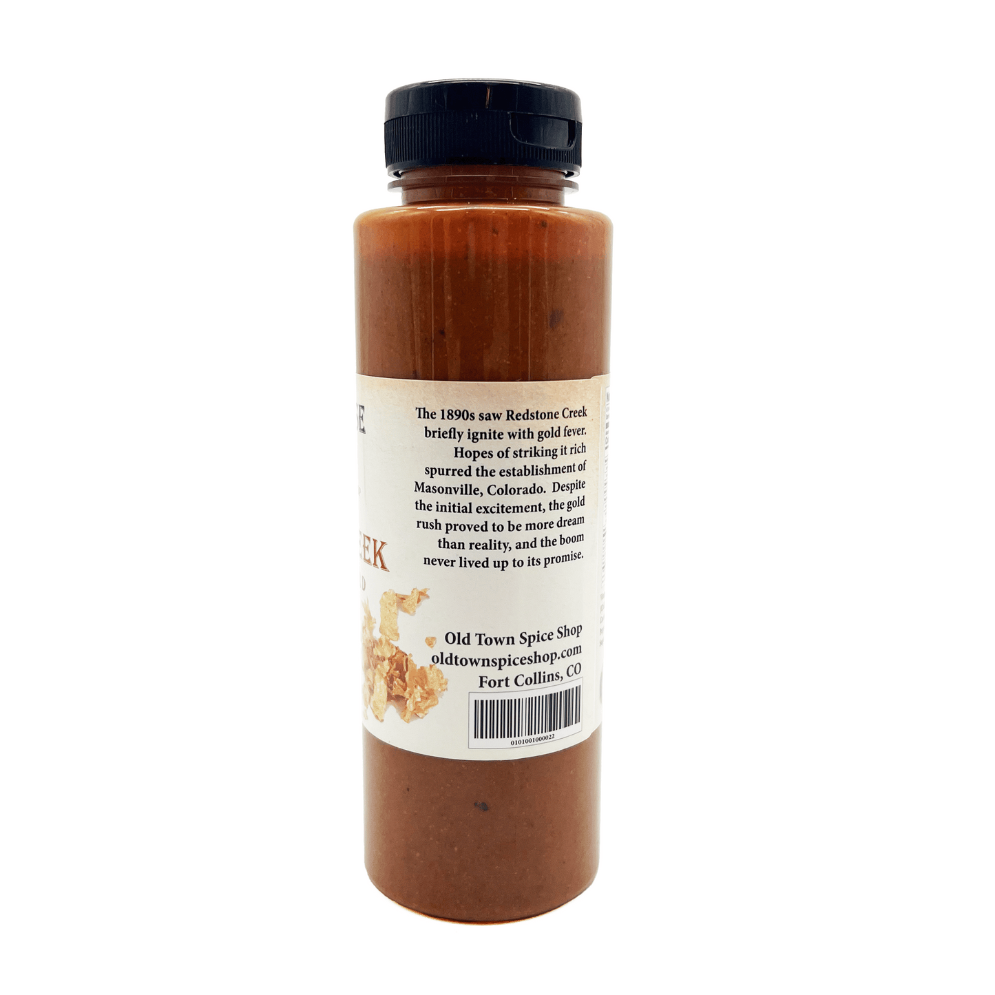 Bottle of Old Town Spice Shop pepper sauce with a label on a white background