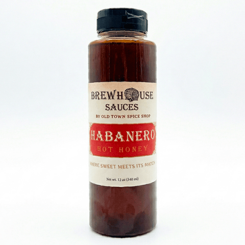 Bottle of Brewhouse Sauces Habanero Hot Honey on a white background