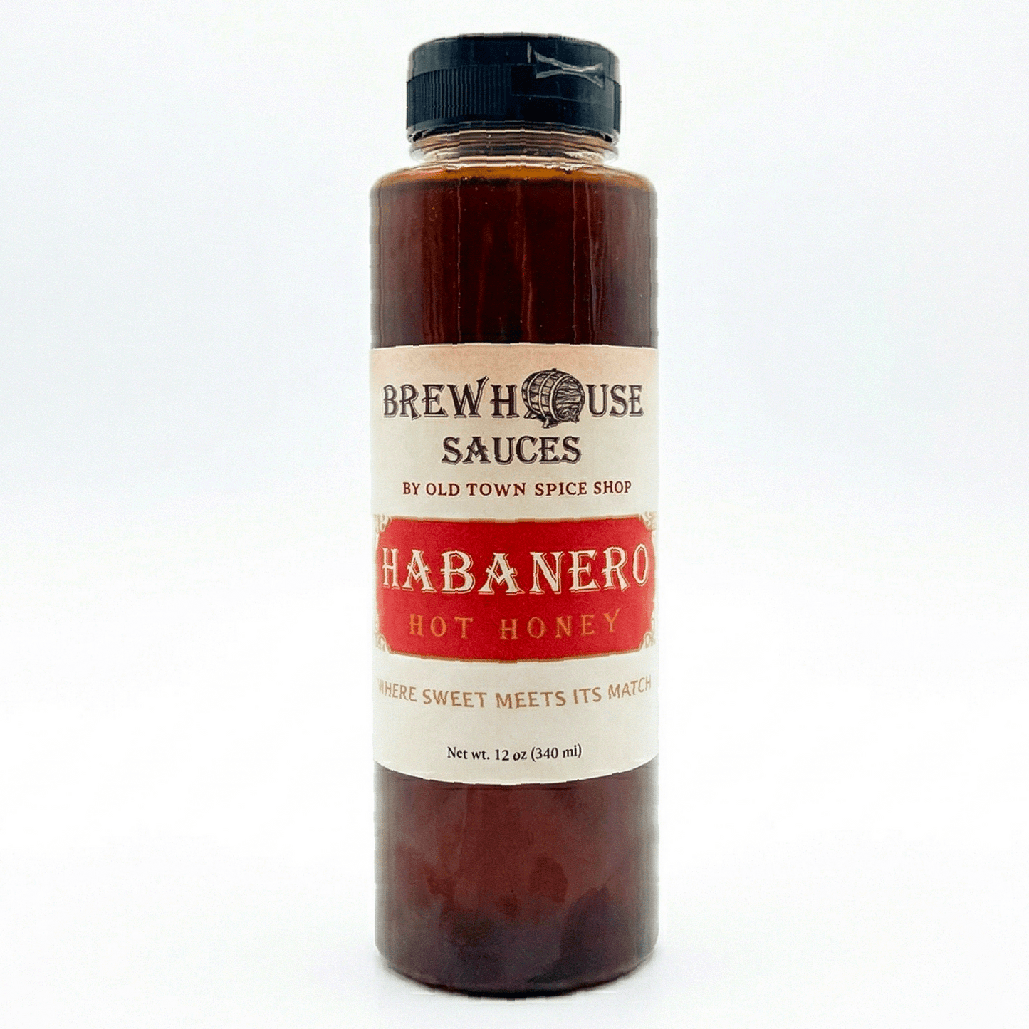 Bottle of Brewhouse Sauces Habanero Hot Honey on a white background