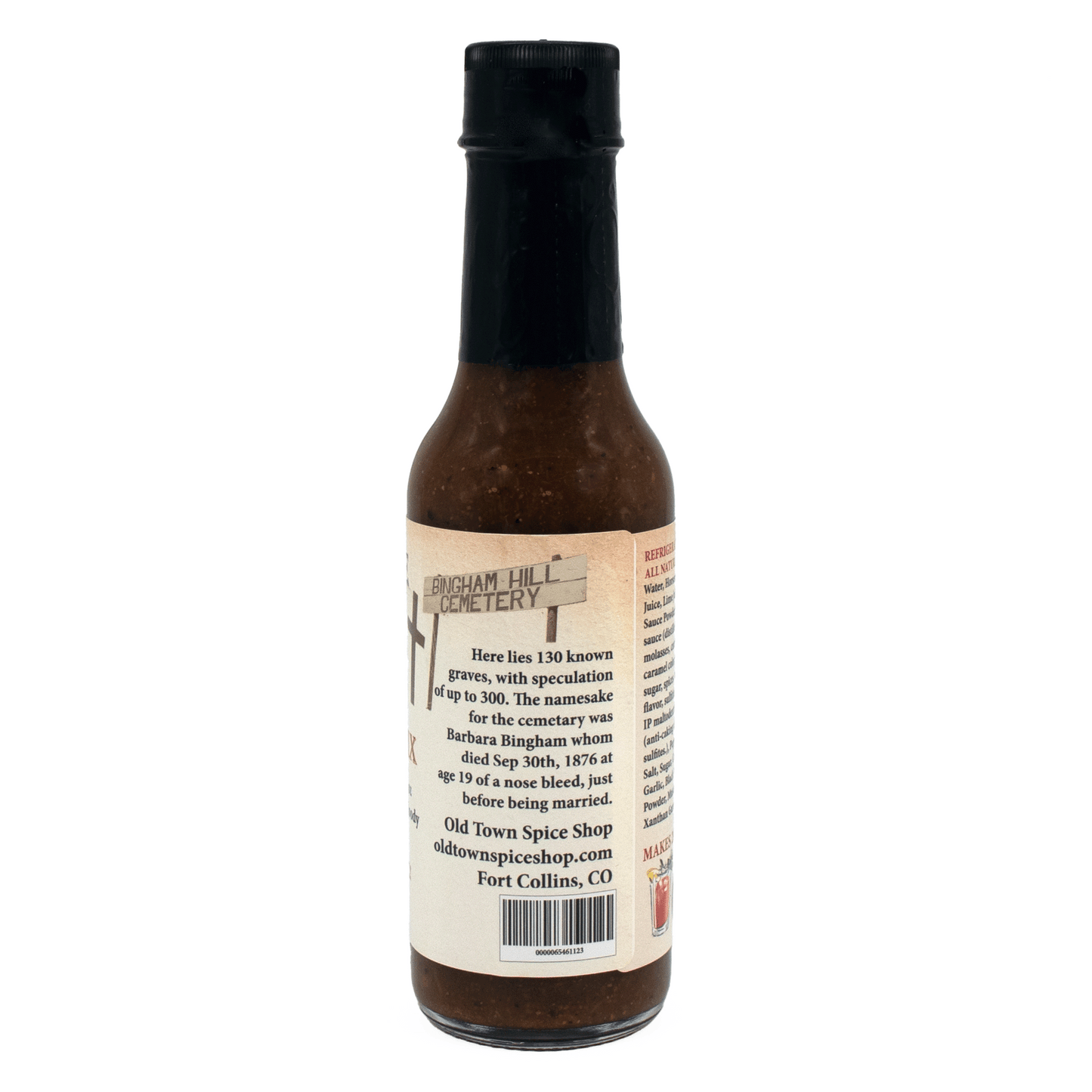 Hot sauce bottle with a label on a white background