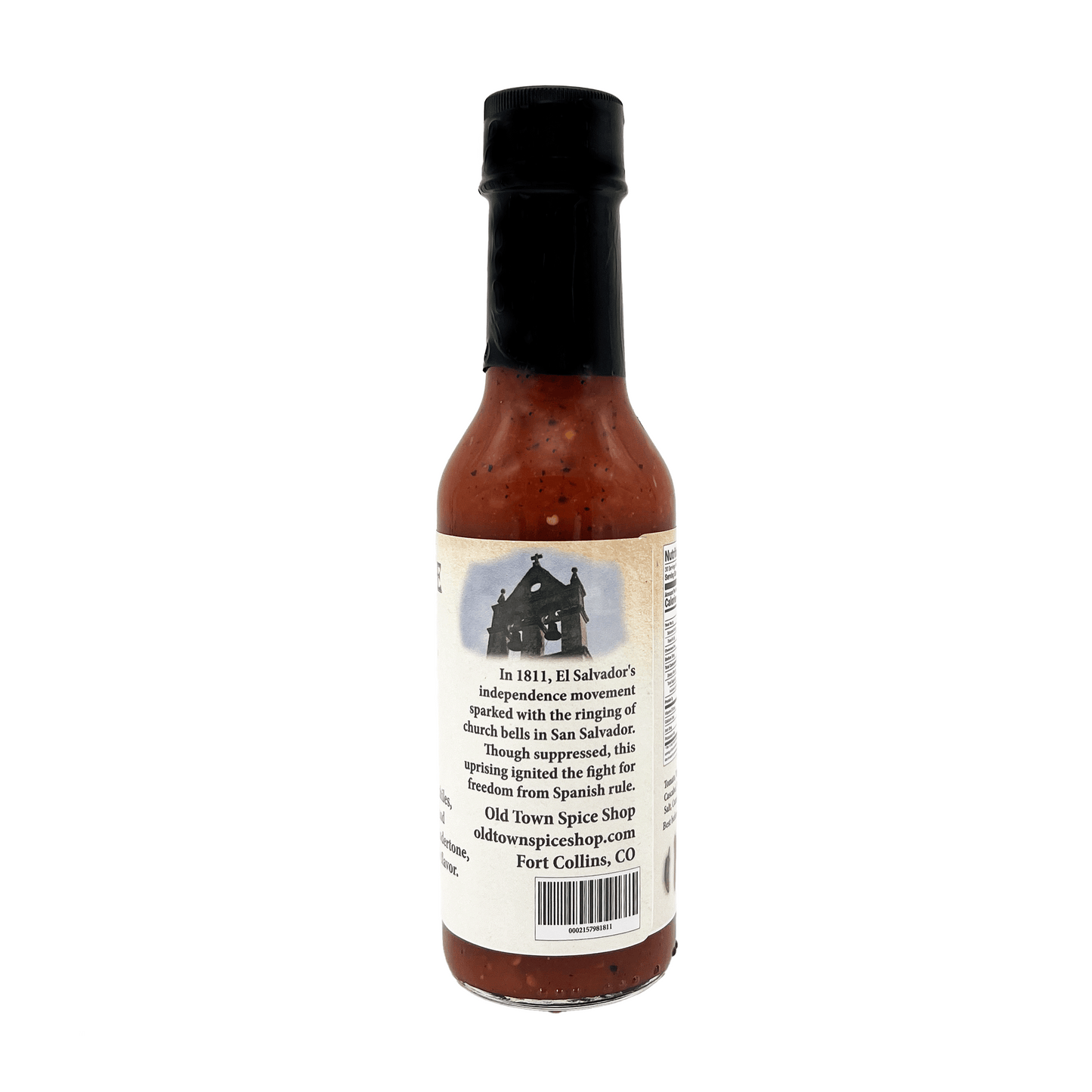 Hot sauce bottle with a label on a white background