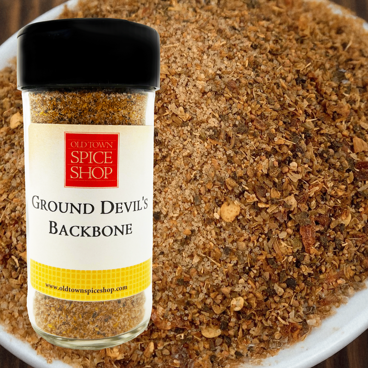 Jar of 'Ground Devil's Backbone' spice from Old Town Spice Shop with a close-up of the spice in the background.