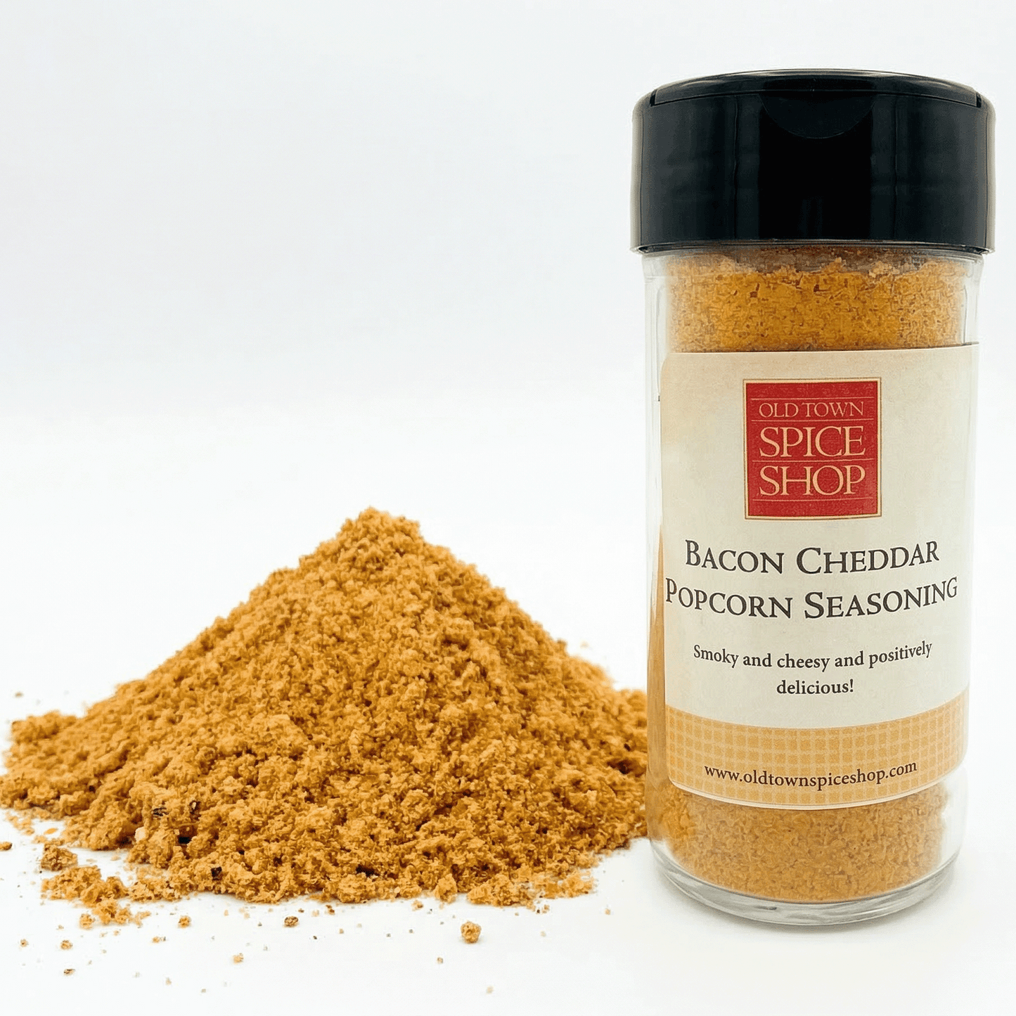 Bacon Cheddar Popcorn Seasoning container with seasoning on a white background