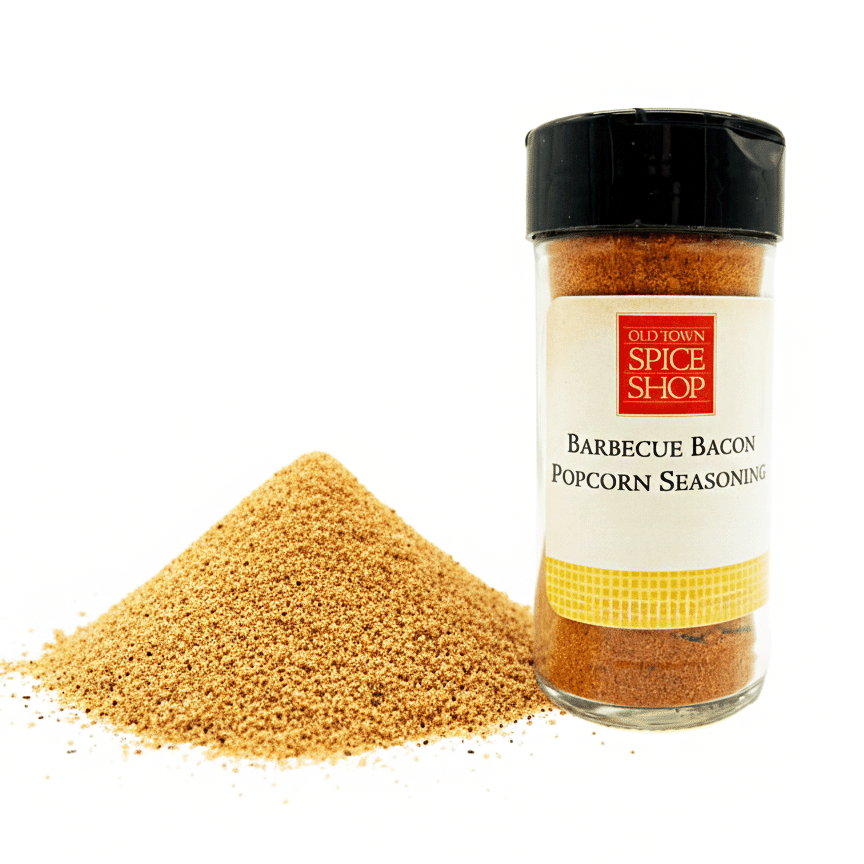 Barbecue Bacon Popcorn Seasoning container from Old Town Spice Shop with spilled seasoning on a white background