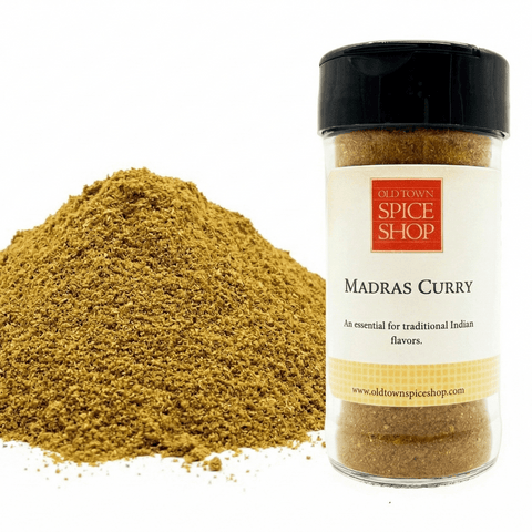 Jar of Old Town Spice Shop Madras Curry spice with a white background