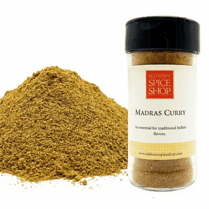 Jar of Old Town Spice Shop Madras Curry spice with a white background