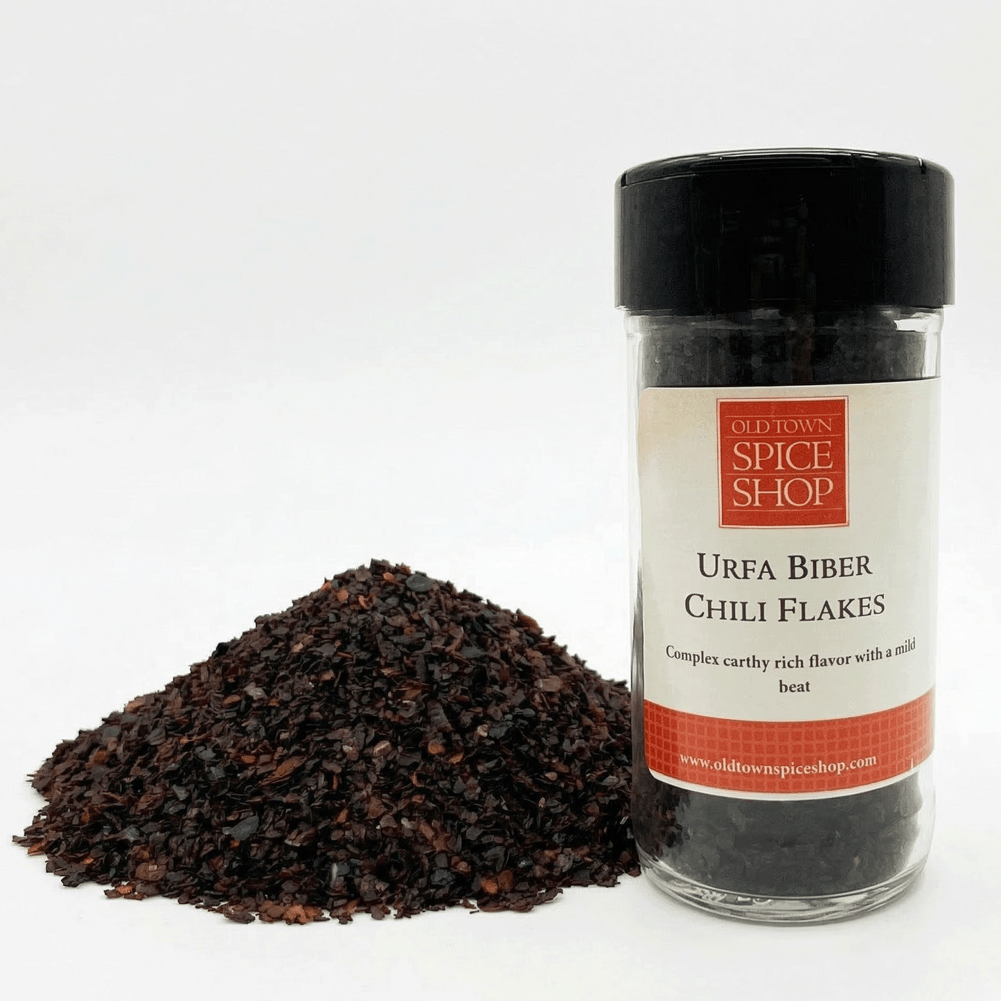 Jar of Old Town Spice Shop Urea Biber Chili Flakes with chili flakes on a white background