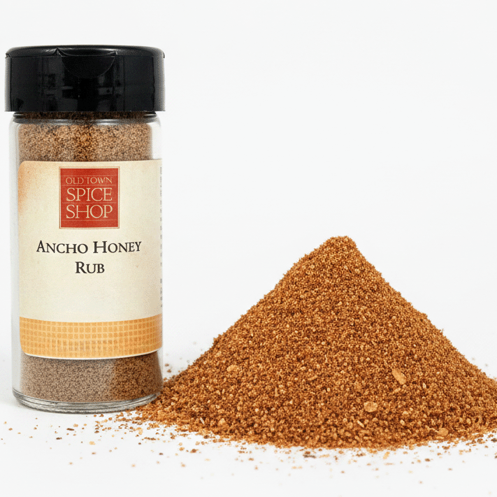 Ancho Honey Rub spice container with a pile of spice on a white background