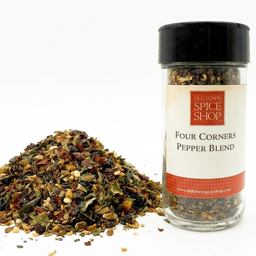 Glass jar of Four Corners Pepper Blend from Old Town Spice Shop with pepper blend on a white background