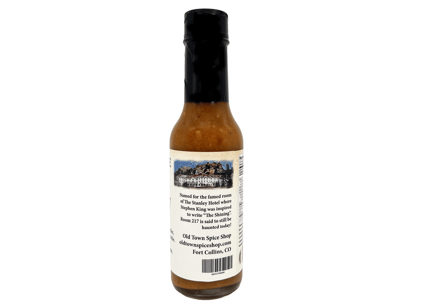 Hot sauce bottle with label on a white background