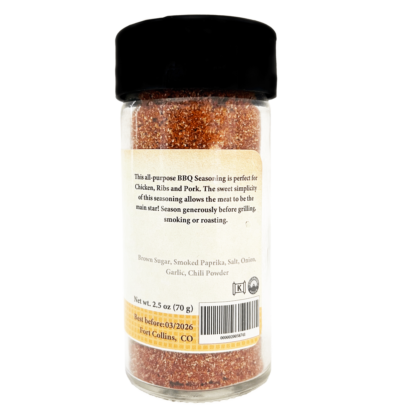 Spice jar with black lid on a white background