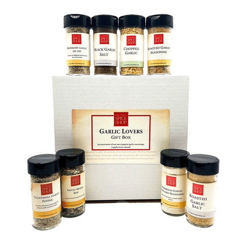 Garlic lovers gift box with various garlic products on a white background