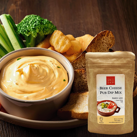 Beer cheese pub dip with soft pretzels