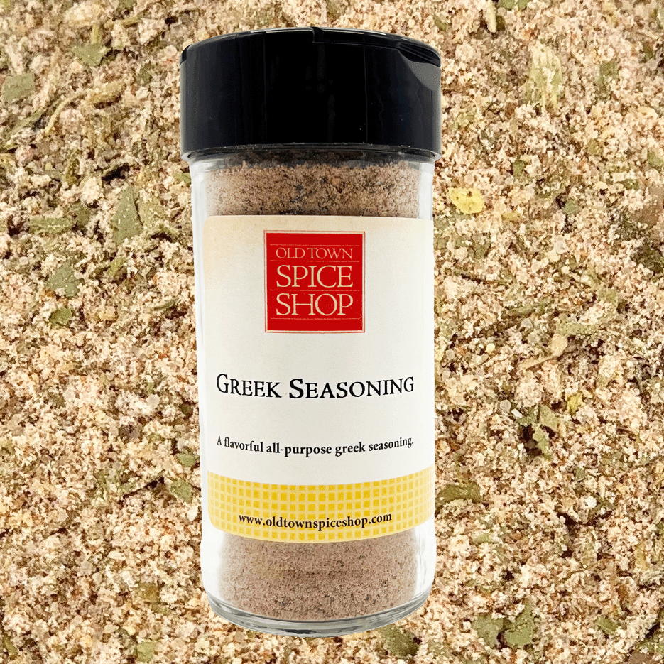 Bottle of Old Town Spice Shop Greek Seasoning on a textured background