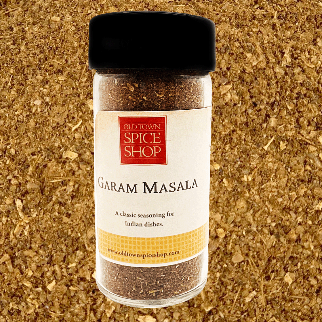 Bottle of Old Town Spice Shop Garam Masala on a textured brown background